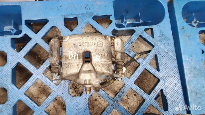 Суппорт тормозной передний правый Mazda 3 (BM/BN)