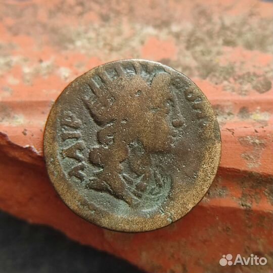 Монета в честь победы Октавиан Август у мыса Акций