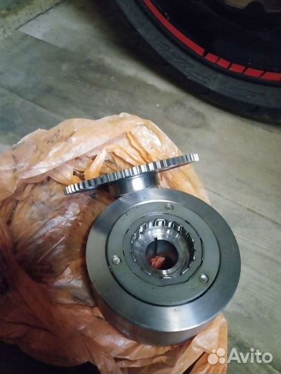 Ротор генератора + обгонная муфта стартера на er6