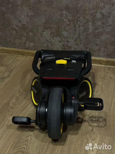 Детский велосипед с ручкой doona liki trike