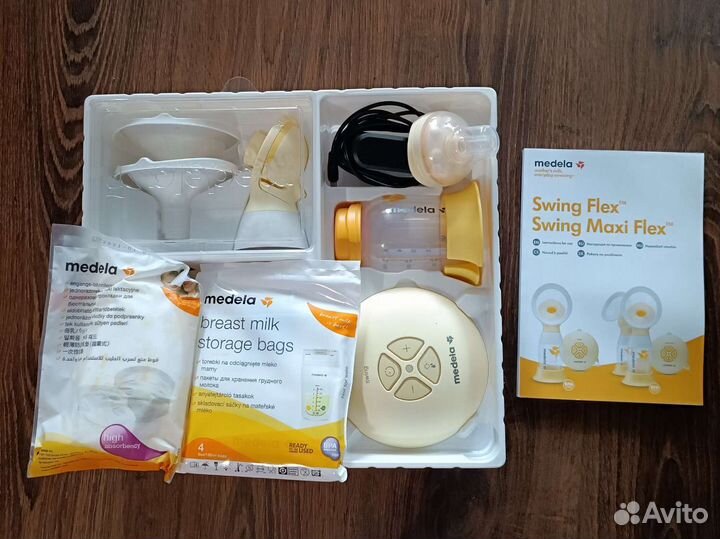 Молокоотсос medela swing электрический