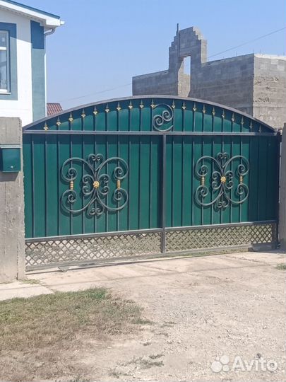 Ворота ручные откатные арочные кованные