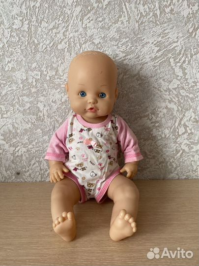 Кукла и одежда для куклы