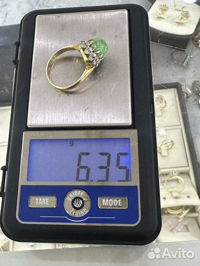 Золотые кольца с бриллиантами и изумрудами 583750