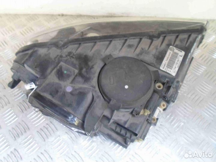 Фара левая Volkswagen Touareg