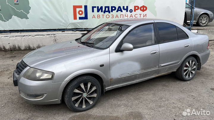 Щит опорный задний левый Nissan Almera Classic (B1