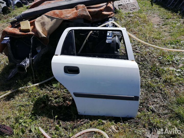 Двери задние Opel Astra G