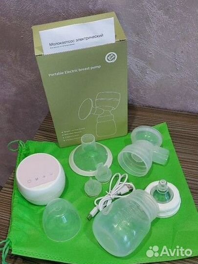 Молокоотсос электрический новый