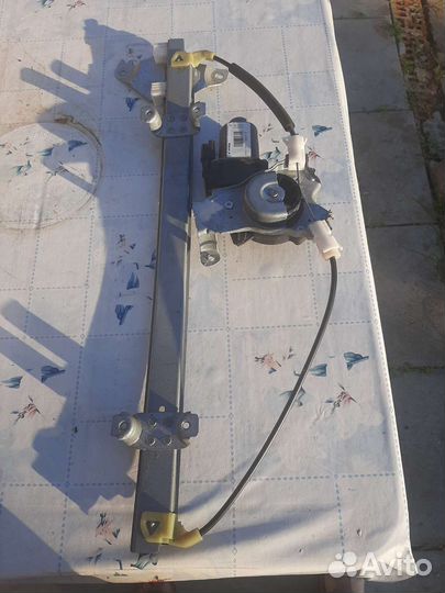 Стеклоподьемник водительской двери Nissan Note