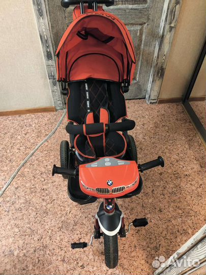 Детский велосипед-коляска BMW трехколесный