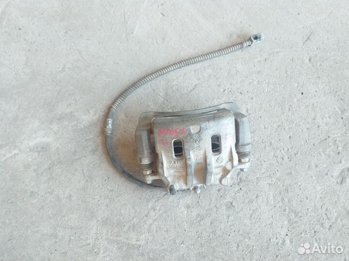 Суппорт тормозной передний SsangYong Kyron