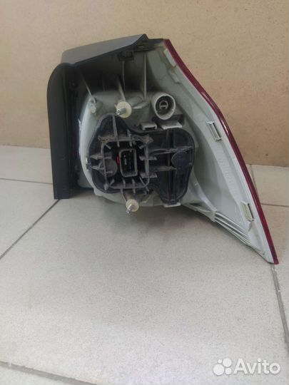 Фонарь левый Фольксваген Гольф 5