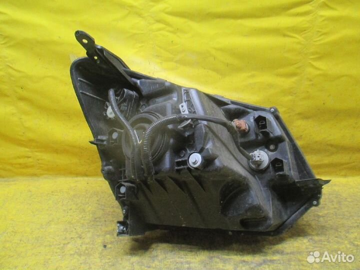 Фара левая Daihatsu Move LA150S