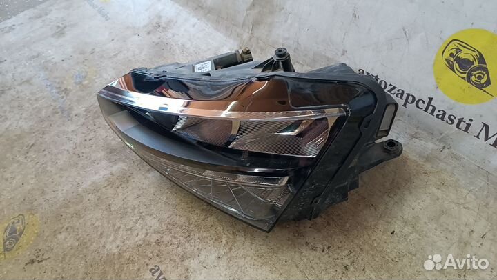 Фара левая Skoda Rapid 2