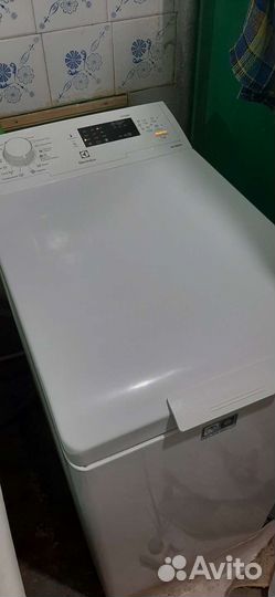 Стиральная машина с вертикальной загр.Electrolux