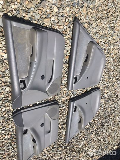 Обшивка двери Toyota Corolla 9 Е120 Е130