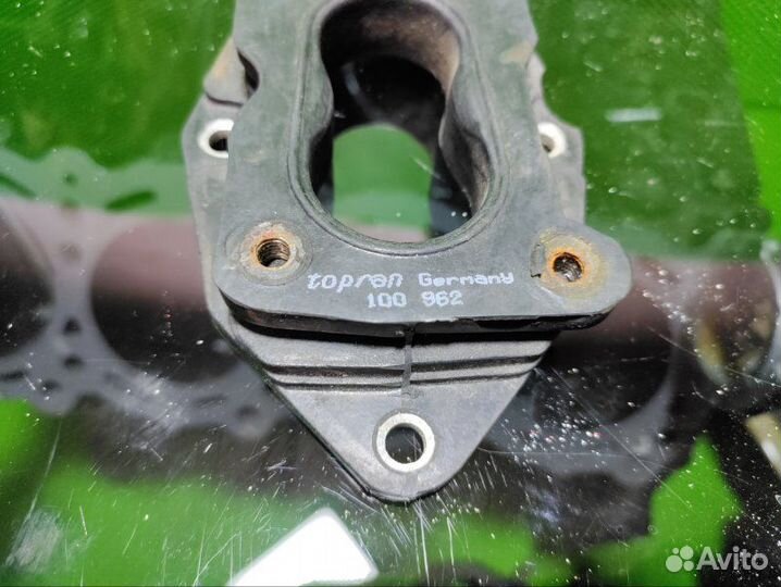 Фланец карбюратора