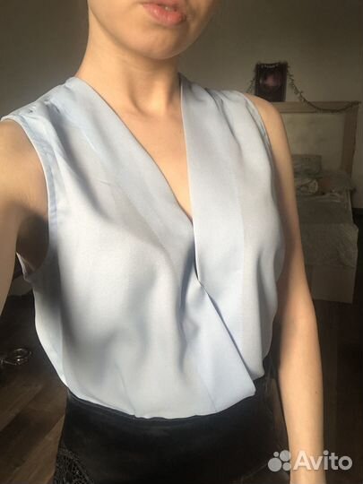 Блузка без рукавов