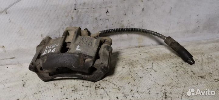 Суппорт передний левый Peugeot 206