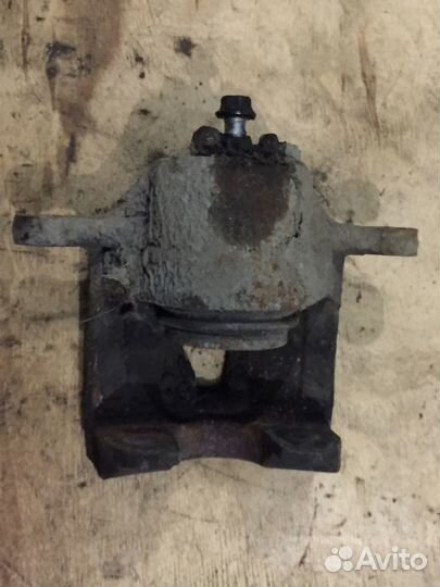 Суппорт тормозной передний правый Kia Rio 4