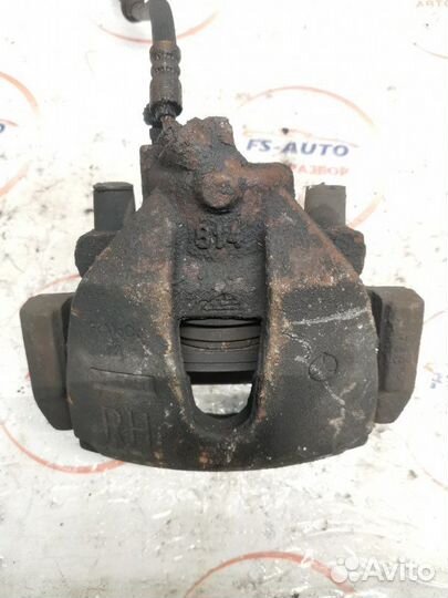 Суппорт тормозной передний правый Mazda 3 седан BK