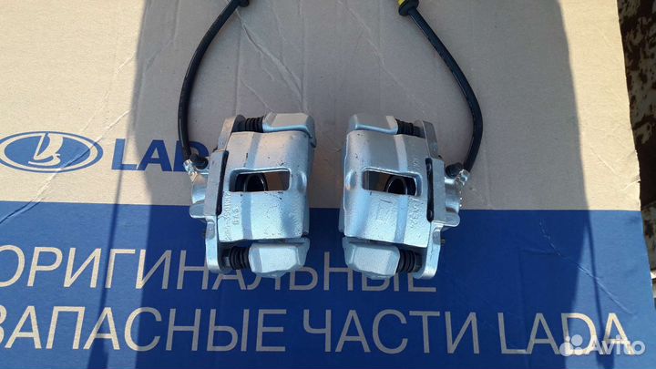 Суппорта тормозные 08 в сборе передние новые пара