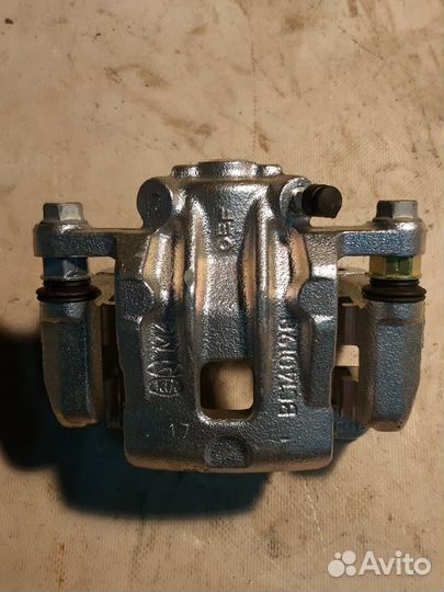 Суппорт задний правый KIA optima