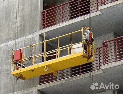 Аренда строительных лесов и фасадных люлек