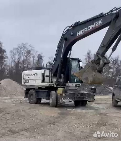 Механизатор колесного экскаватора