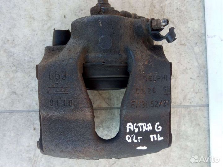 Суппорт тормозной передний левый Opel Astra G