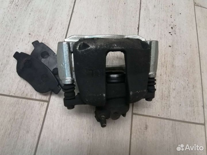 Супорт перед.левый Geely Emgrand EC7