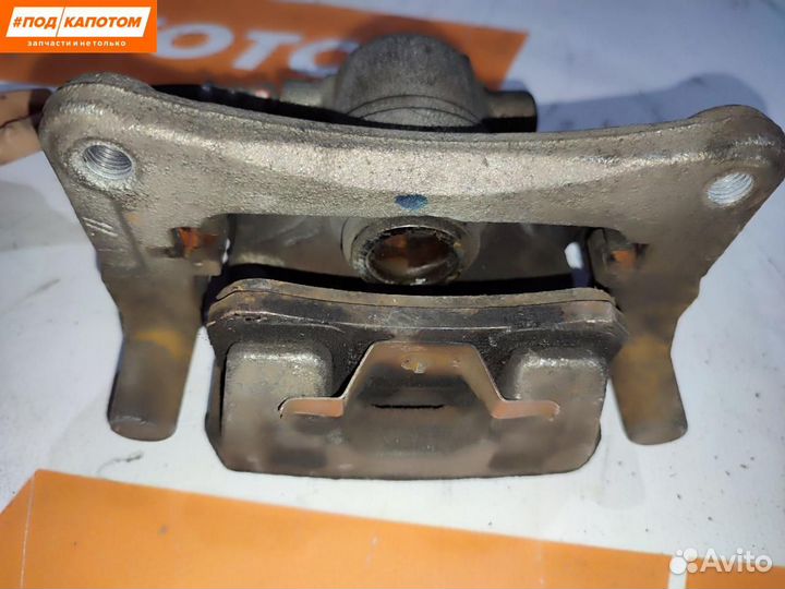 Суппорт тормозной задний правый Mitsubishi Lancer