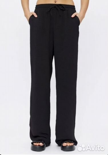 Костюм брючный новый 48