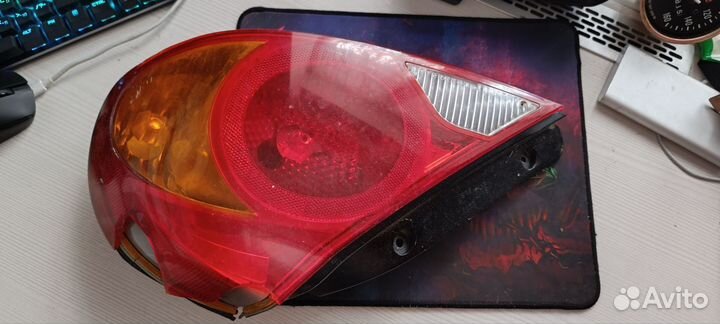 Задний левый фонарь kia spectra