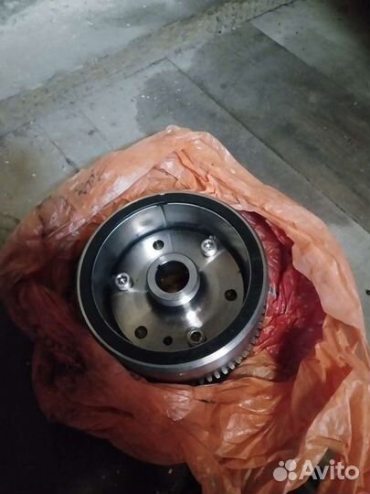 Ротор генератора + обгонная муфта стартера на er6