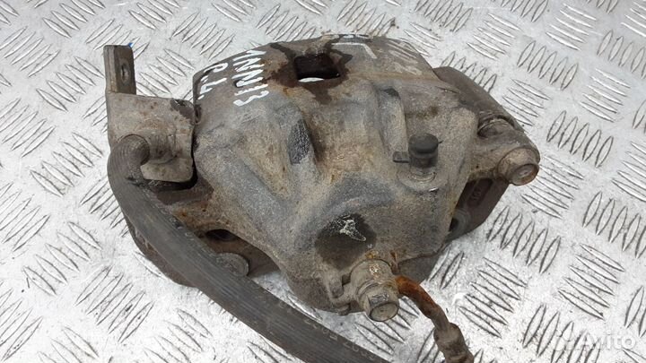 Суппорт передний левый Kia Soul рест. 2012