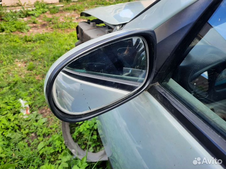 Зеркала левое на Nissan Almera N16