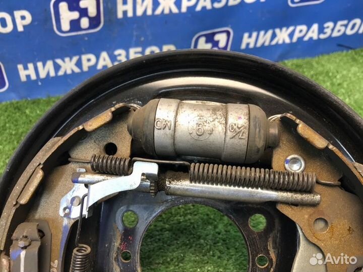 Щит опорный задний левый Kia Rio 3 1.6 G4FC 2017