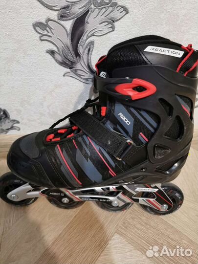 Роликовые коньки