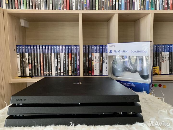 Sony Playstation 4 PRO 1Tb + более 100 игр