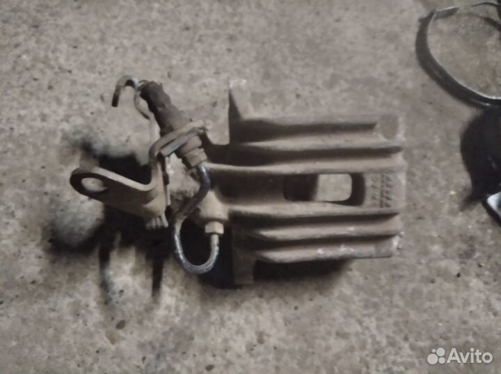 Суппорт тормозной Skoda Octavia Jetta