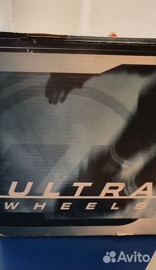 Роликовые коньки