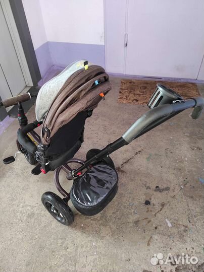 Трехколесный велосипед с ручкой