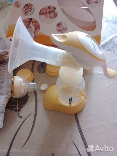 Молокоотсос medela