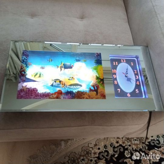 Часы с рыбами
