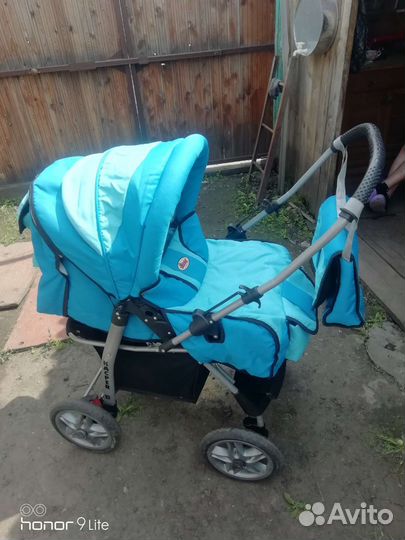 Детская коляска с перекидной ручкой