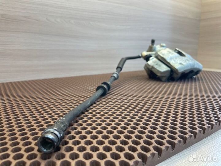 Суппорт тормозной передний правый Skoda Rapid