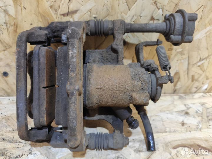 Суппорт задний левый Opel Astra J