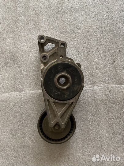 Натяжитель ремня Volkswagen