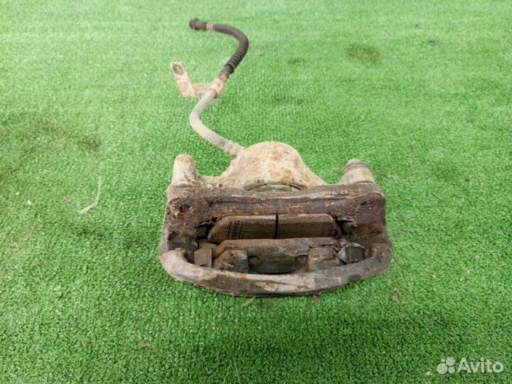 Суппорт тормозной передний левый Hyundai Accent